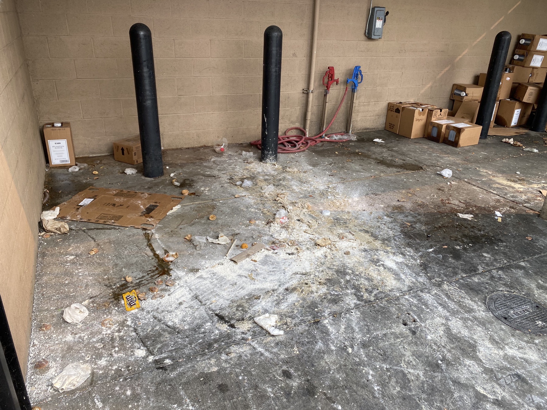 Orange County commercial dumpster pad before deep cleaning