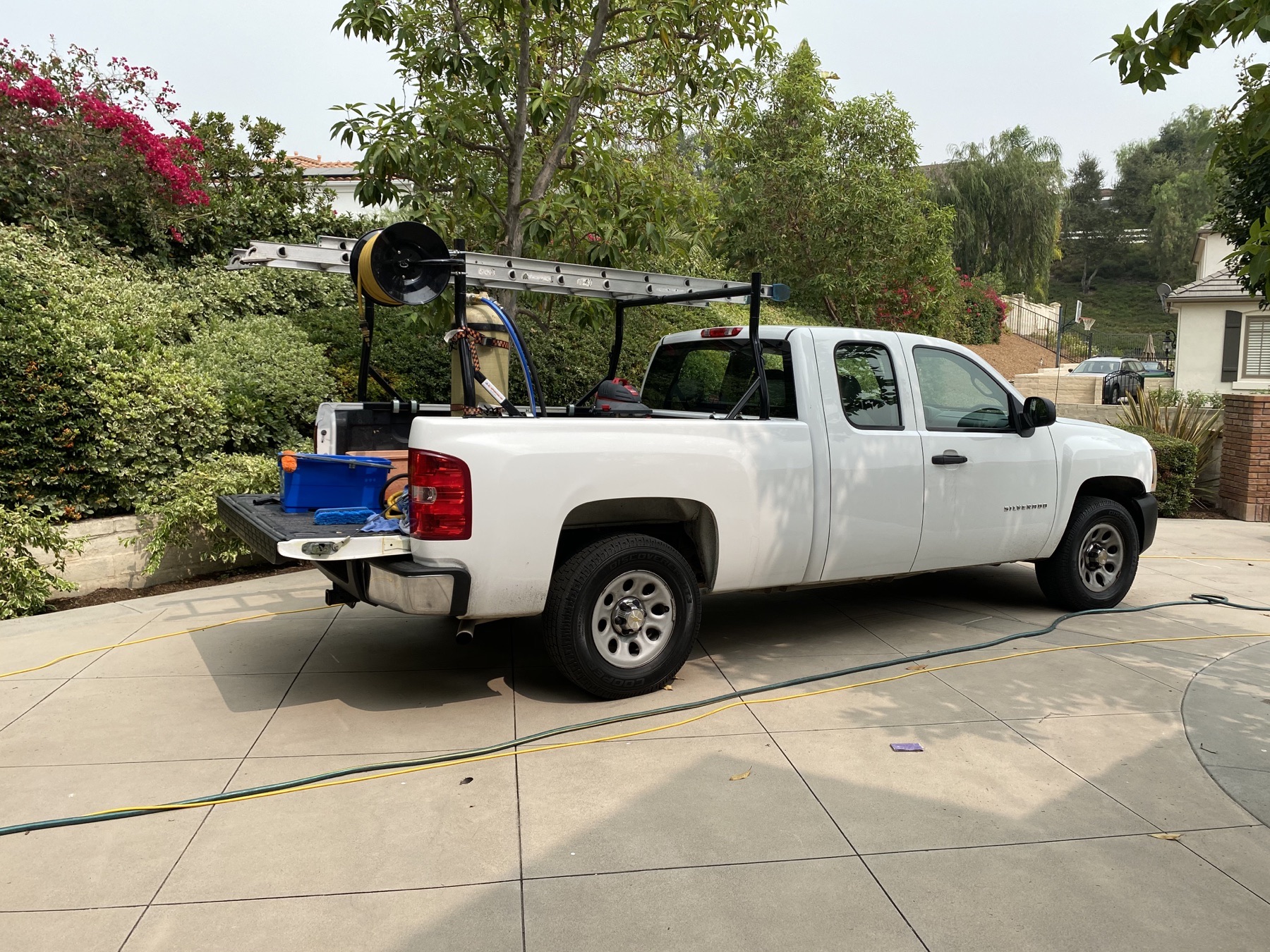 American Power Washing professional equipment at a residential project